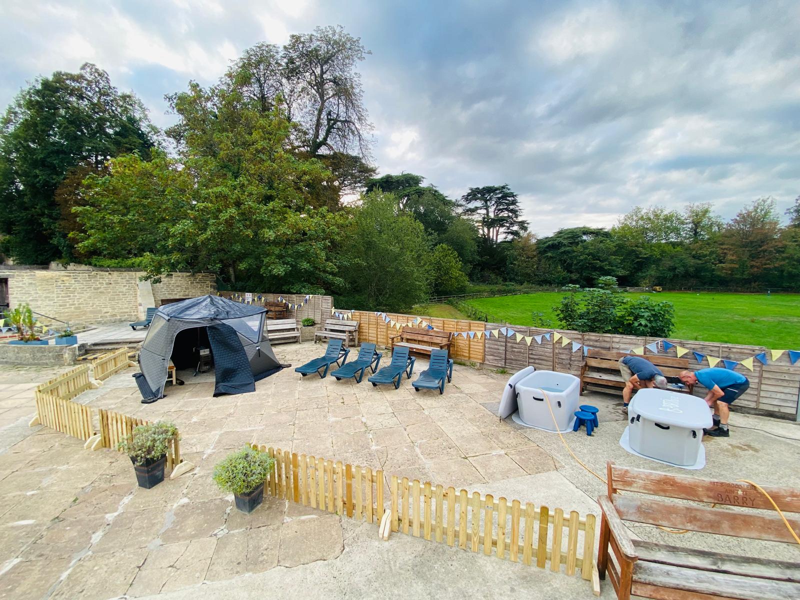 The sauna, plunge pools and sun loungers on the poolside terrace