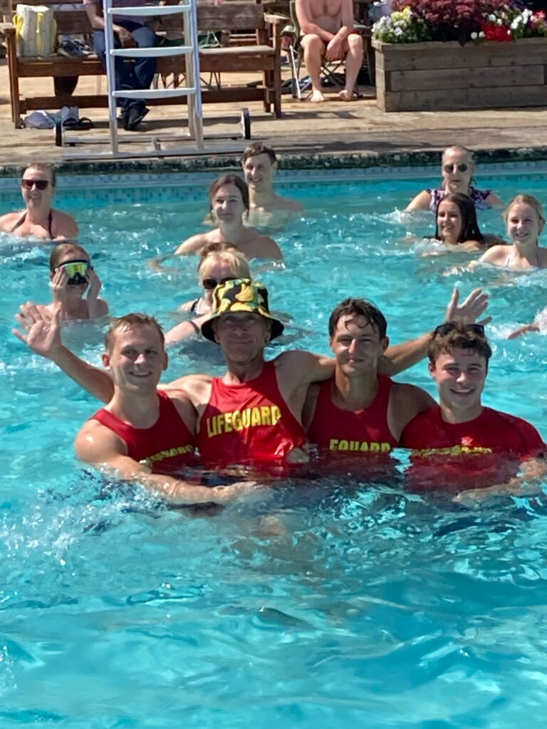 Boys having fun in the pool on Hawaiian Day